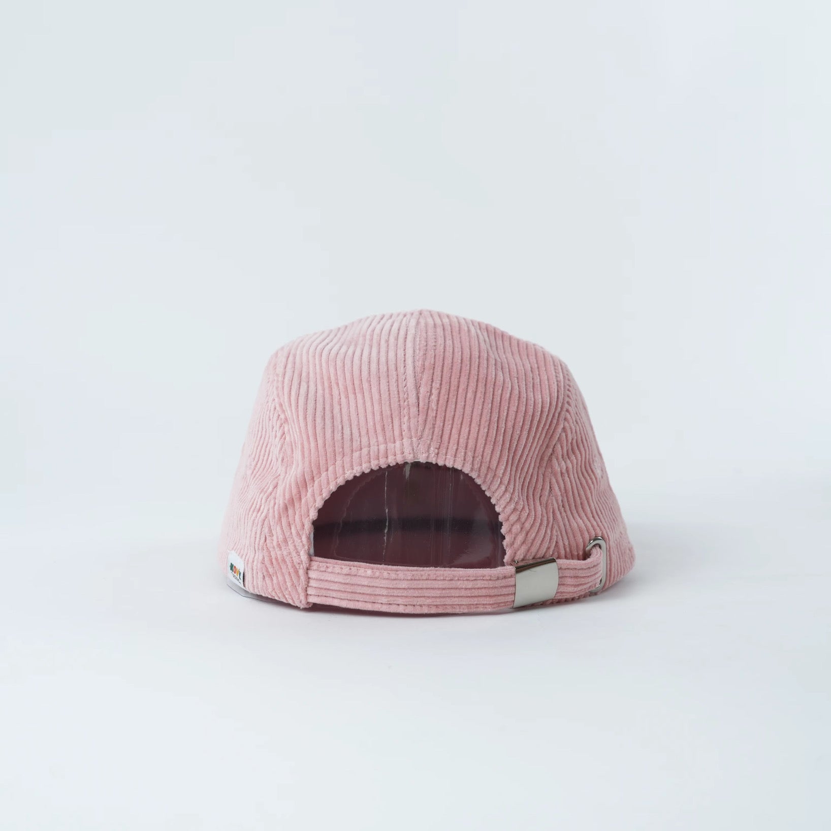 Pink kids corduroy hat with a rainbow design 