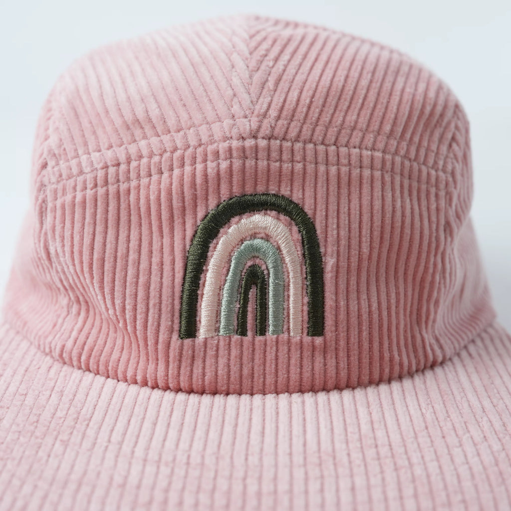 Pink kids corduroy hat with a rainbow design 